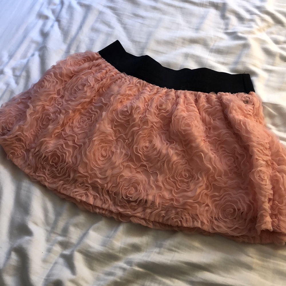 Pink skirt with tulle flower detailing